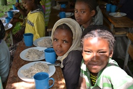 School girls eating in Ethiopia